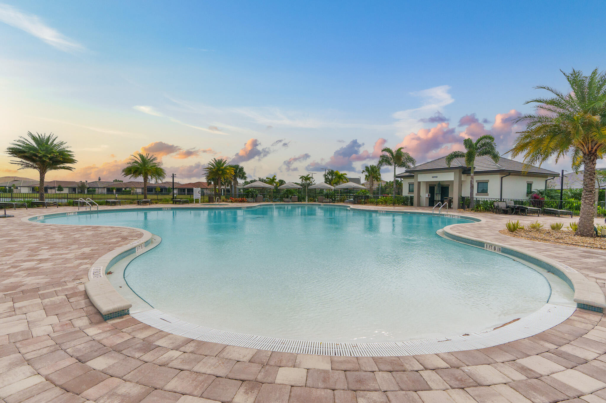 8202 Cadre Noir Road Lake Worth, FL 33467 - Photo 41 of 58 a view of a swimming pool and lake view
