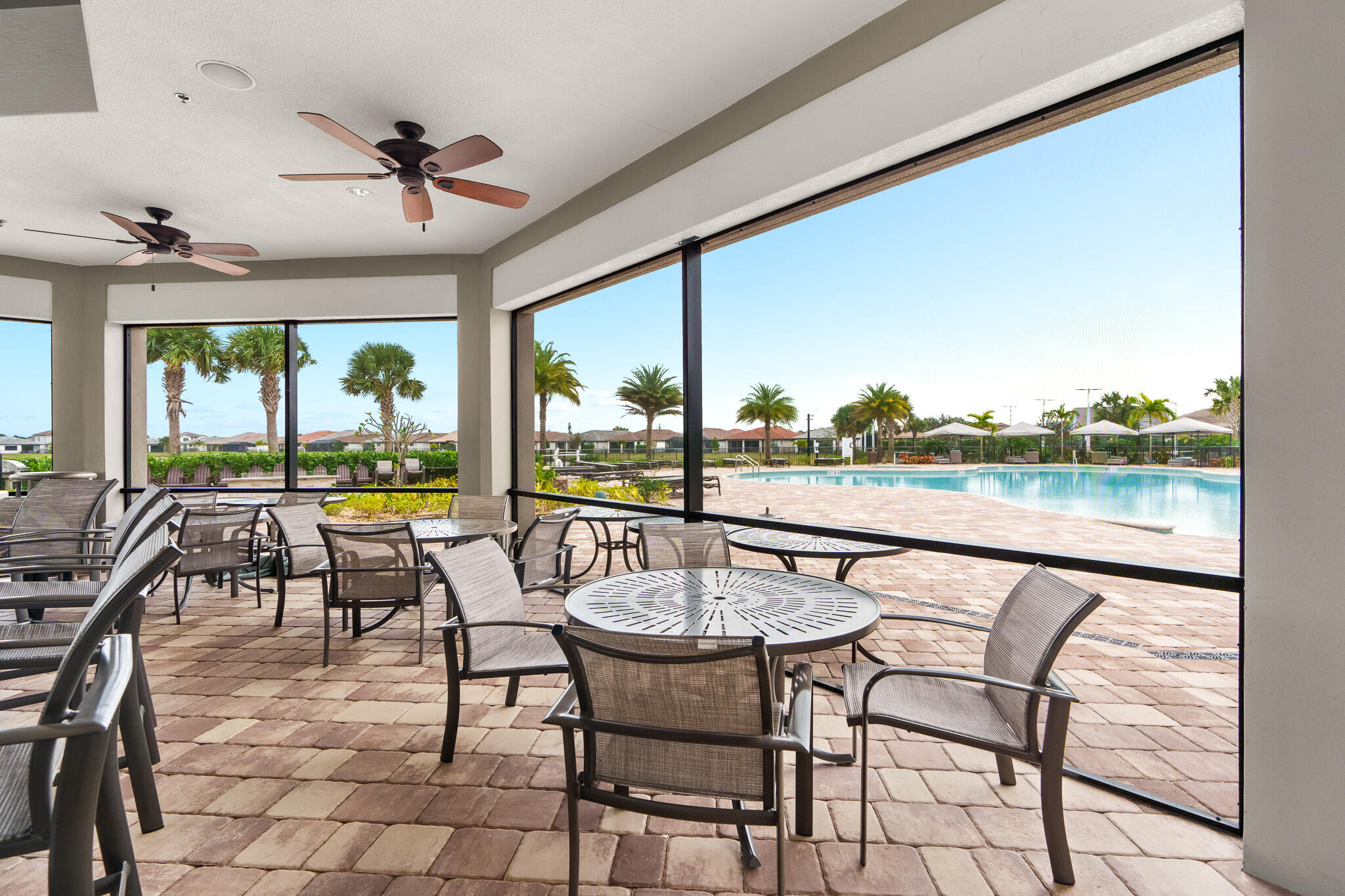 8202 Cadre Noir Road Lake Worth, FL 33467 - Photo 45 of 58 a view of a dining room with furniture window and outside view