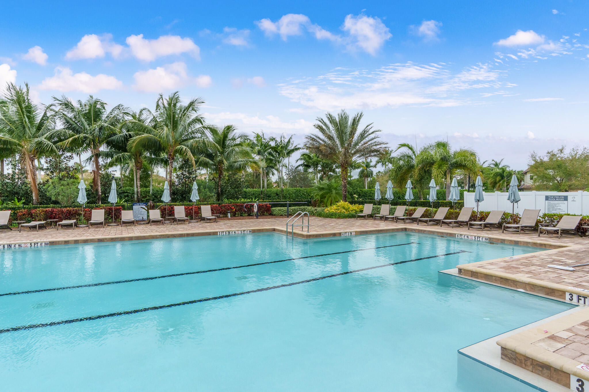 8202 Cadre Noir Road Lake Worth, FL 33467 - Photo 50 of 58 a view of swimming pool with outdoor seating and plants