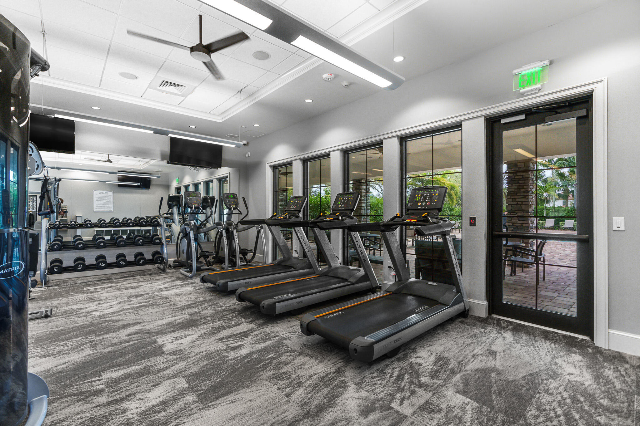 8202 Cadre Noir Road Lake Worth, FL 33467 - Photo 57 of 58 a view of a room with gym equipment