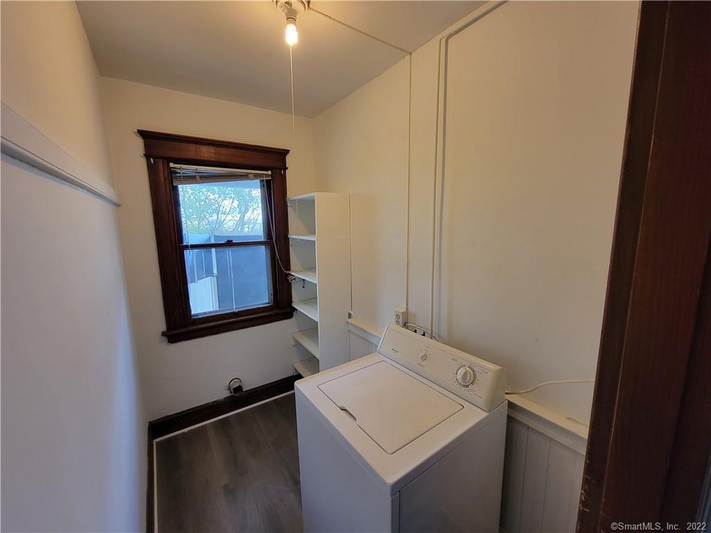 393 Highland Avenue, Unit 3 Waterbury, CT 06708 - Photo 5 of 10 a utility room with dryer and washer