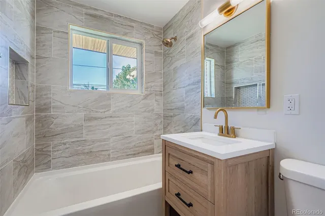 a bathroom with a sink and a bathtub