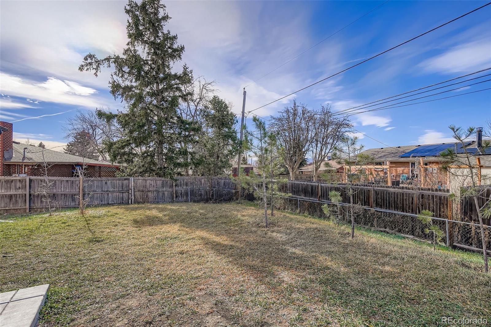 8771 Rutgers Street Westminster, CO 80031 - Photo 19 of 25 a view of a backyard