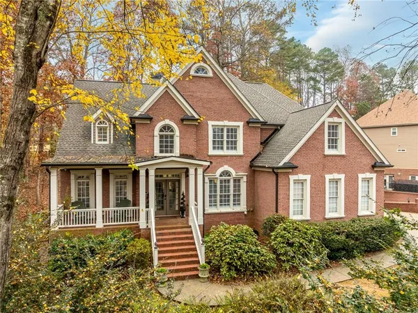 front view of a house with a yard