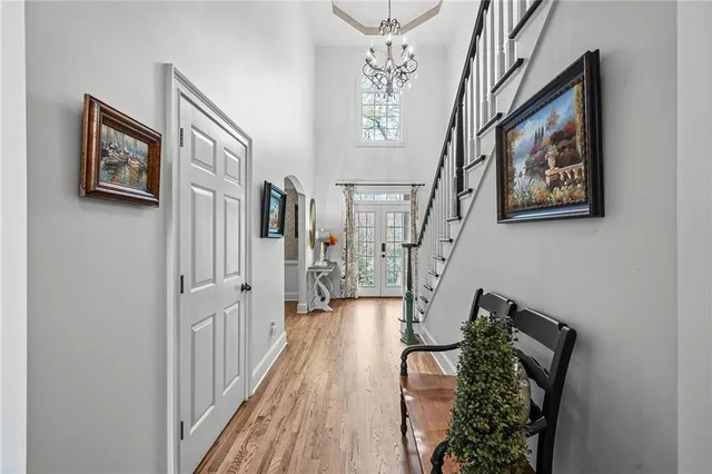a white toilet sitting next to a shower curtain