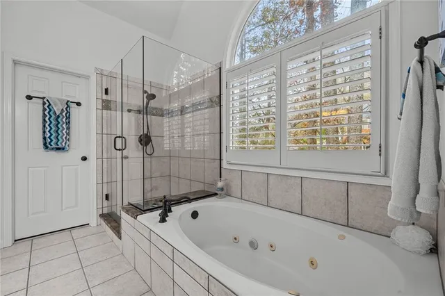 an aerial view of residential house with outdoor space and river