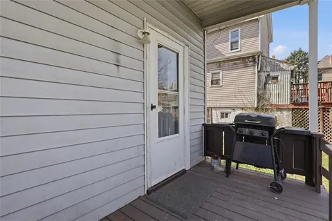 a kitchen with stainless steel appliances granite countertop a sink and wooden cabinets