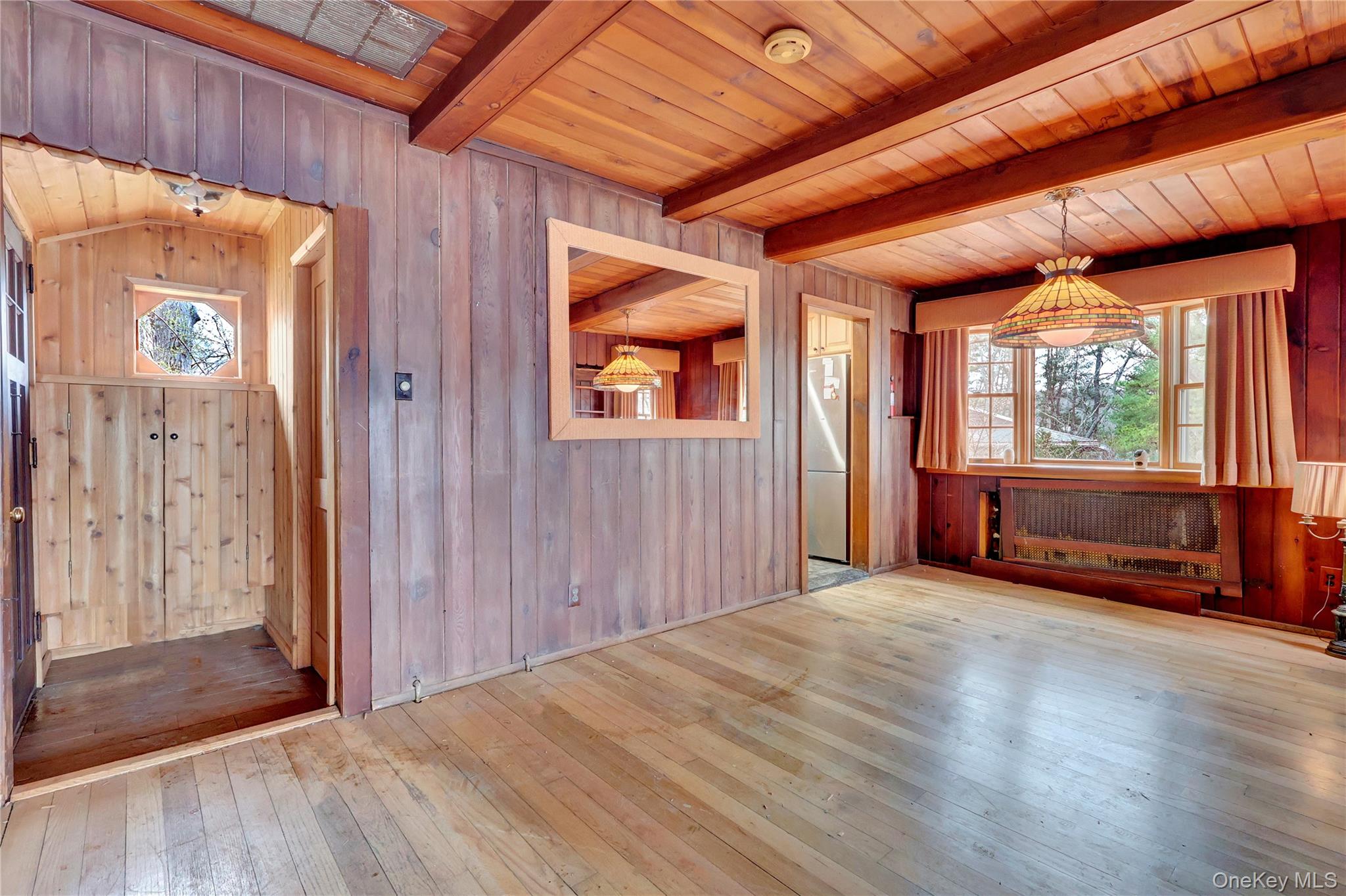 97 Lakeside Trail Ridge, NY 11961 - Photo 14 of 25 dining area front entry and access to bathroom