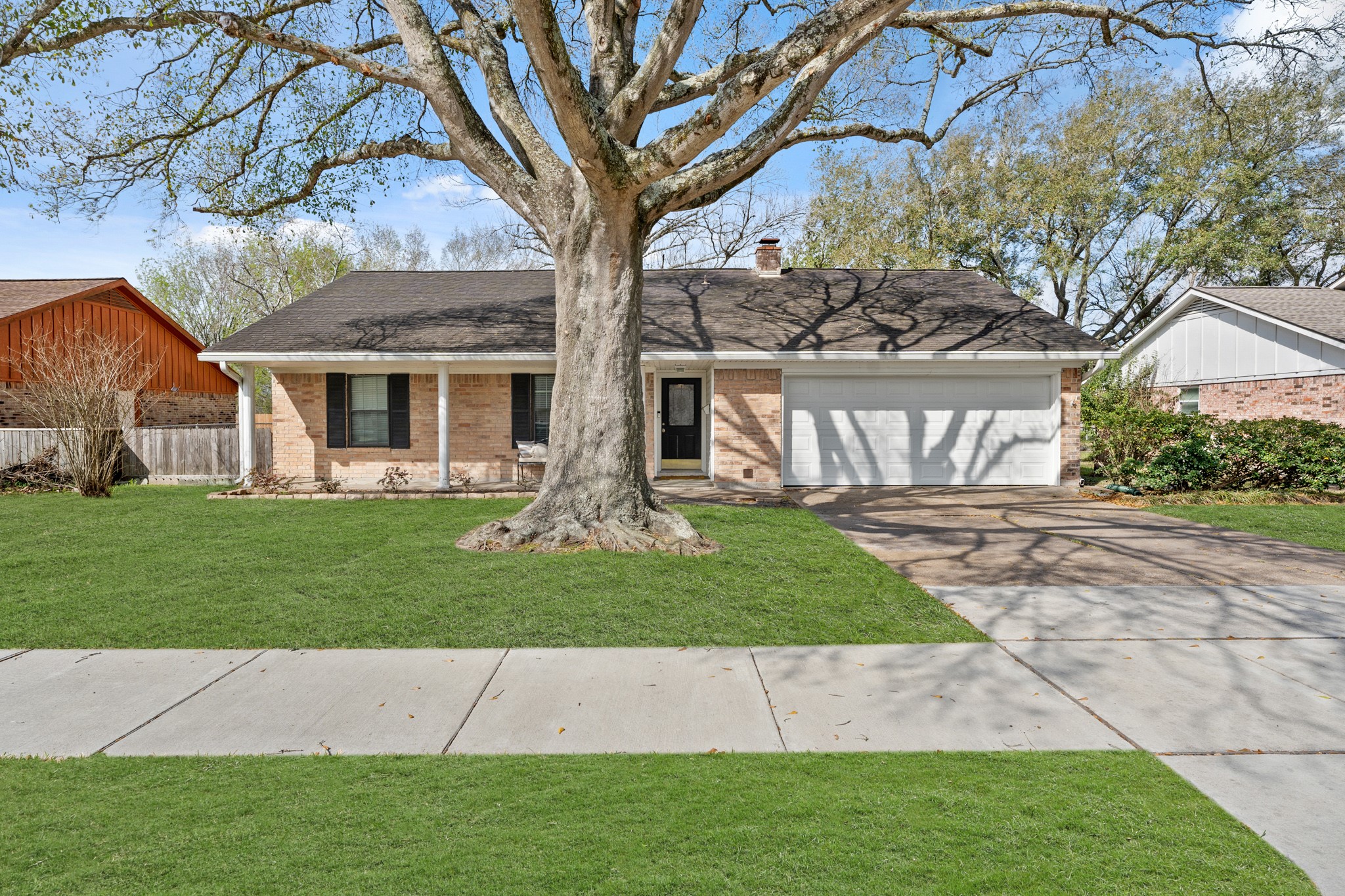 2104 Rose Road Pearland, TX 77581 - Photo 2 of 43 a front view of a house with a yard