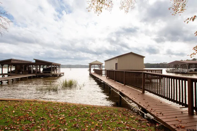 a view of a chairs and tables in the balcony