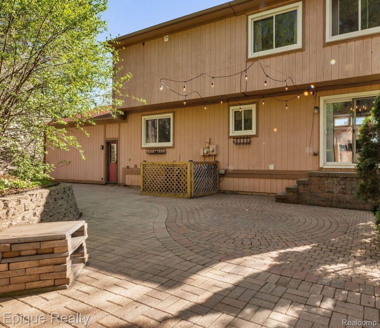 9633 Ridge Top Trail Clarkston, MI 48348 - Photo 29 of 32 8,000 brick paver backyard patio