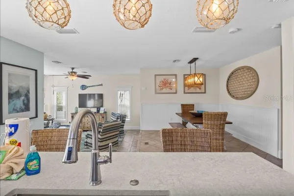 a kitchen with a sink stove and refrigerator