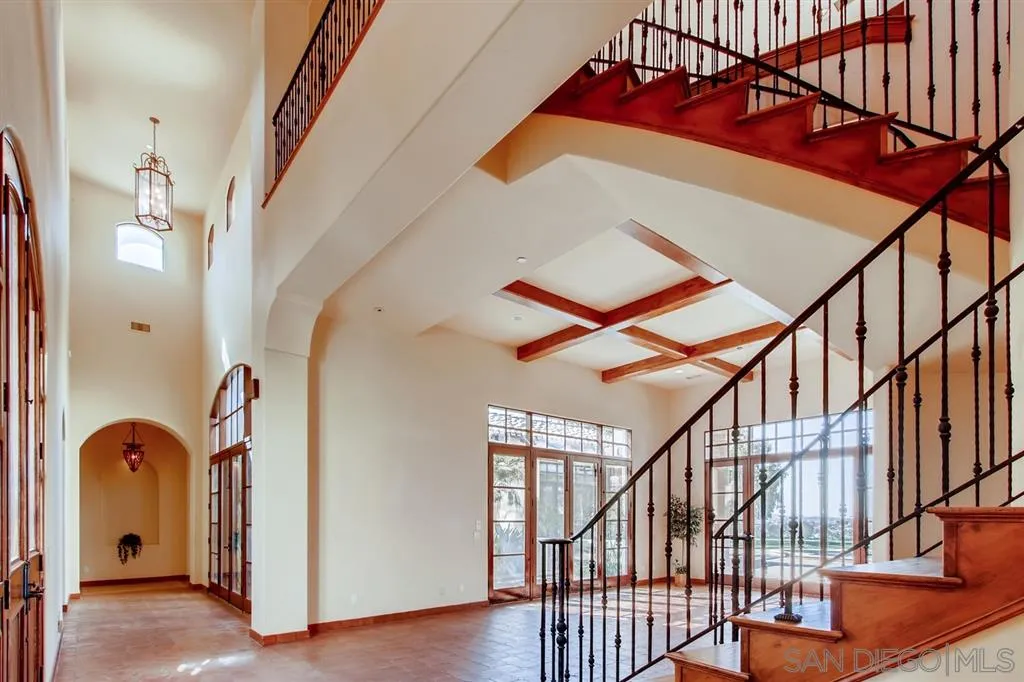 14160 Bryce Point Poway, CA 92064 - Photo 18 of 25 a view of staircase with railing and a chandelier