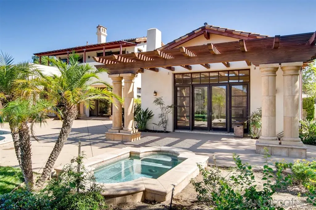 14160 Bryce Point Poway, CA 92064 - Photo 20 of 25 a view of a house with large windows and plants