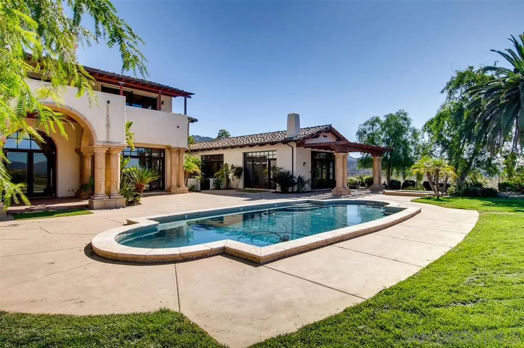 14160 Bryce Point Poway, CA 92064 - Photo 22 of 25 a view of house with swimming pool and yard