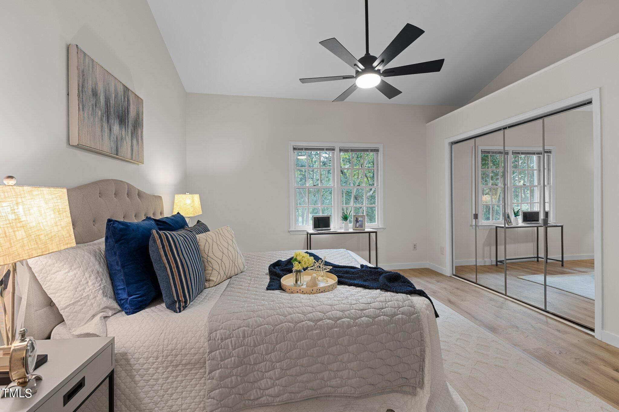 1440 Barton Pl Drive Raleigh, NC 27608 - Photo 22 of 57 a bedroom with a bed and window