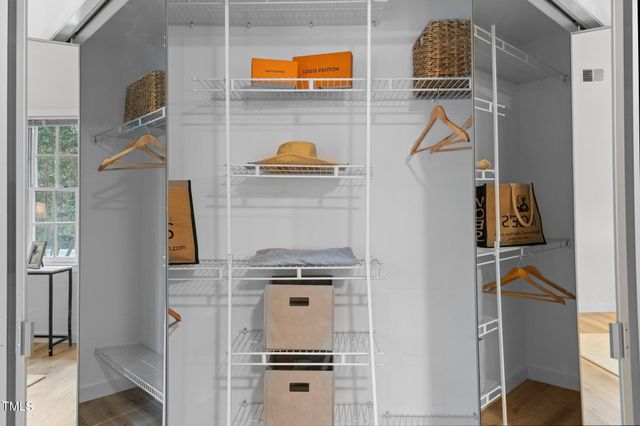 a view of a room with racks on the wall