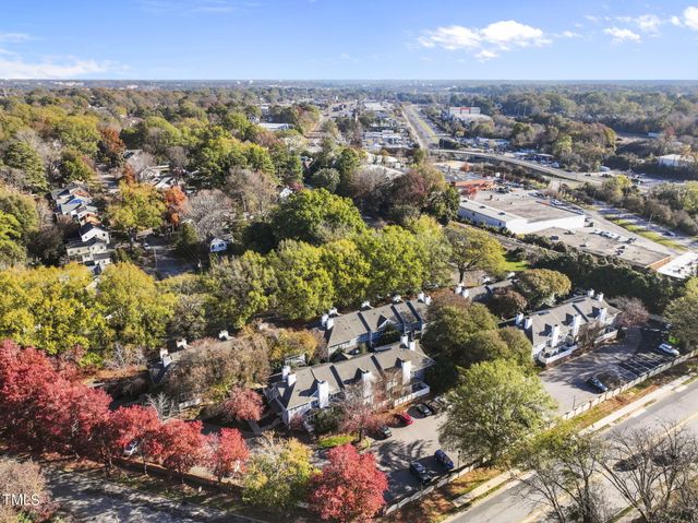 a view of street with parked cars