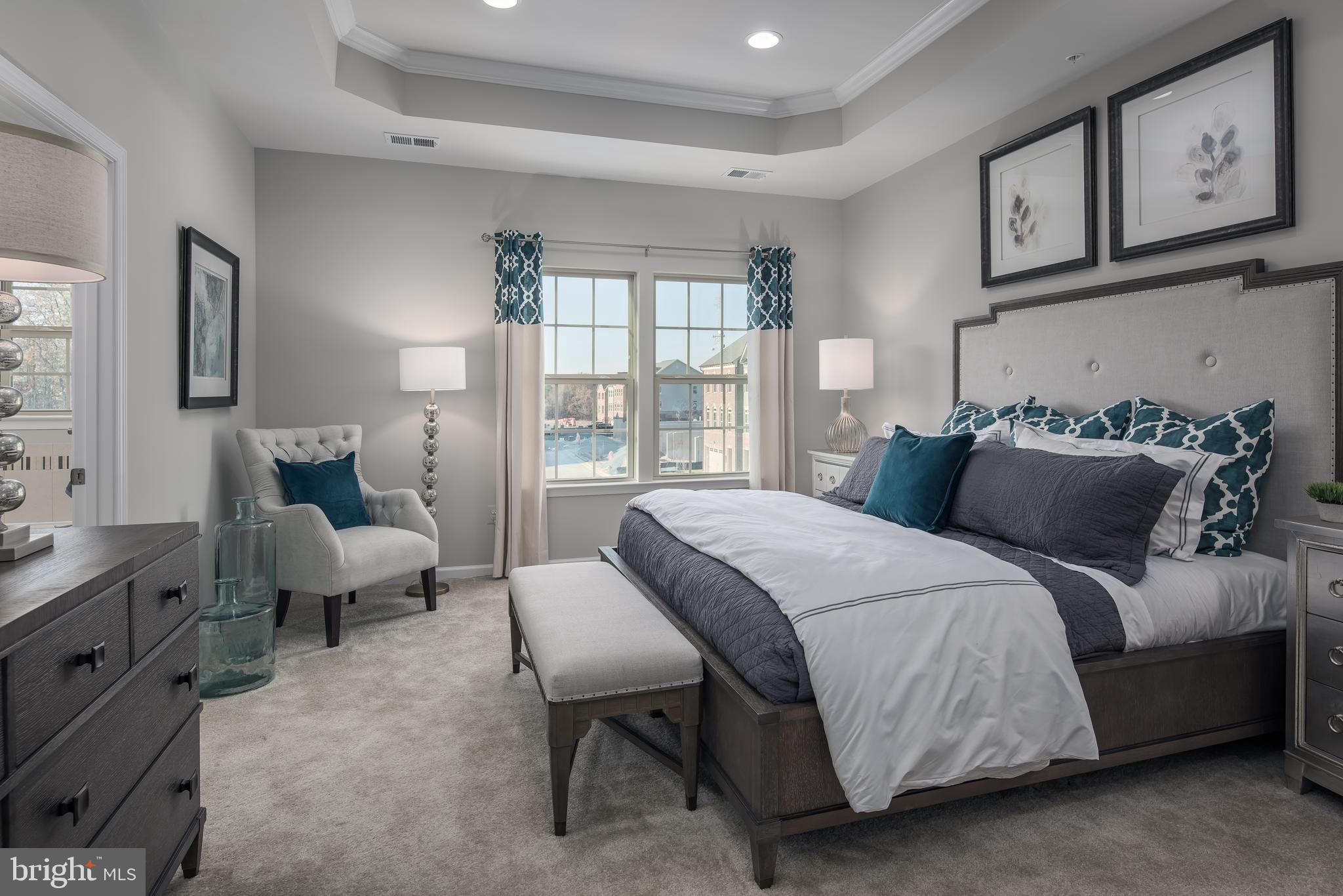 7899 Mine Run Road Hanover, MD 21076 - Photo 14 of 30 a bedroom with a bed and glass window