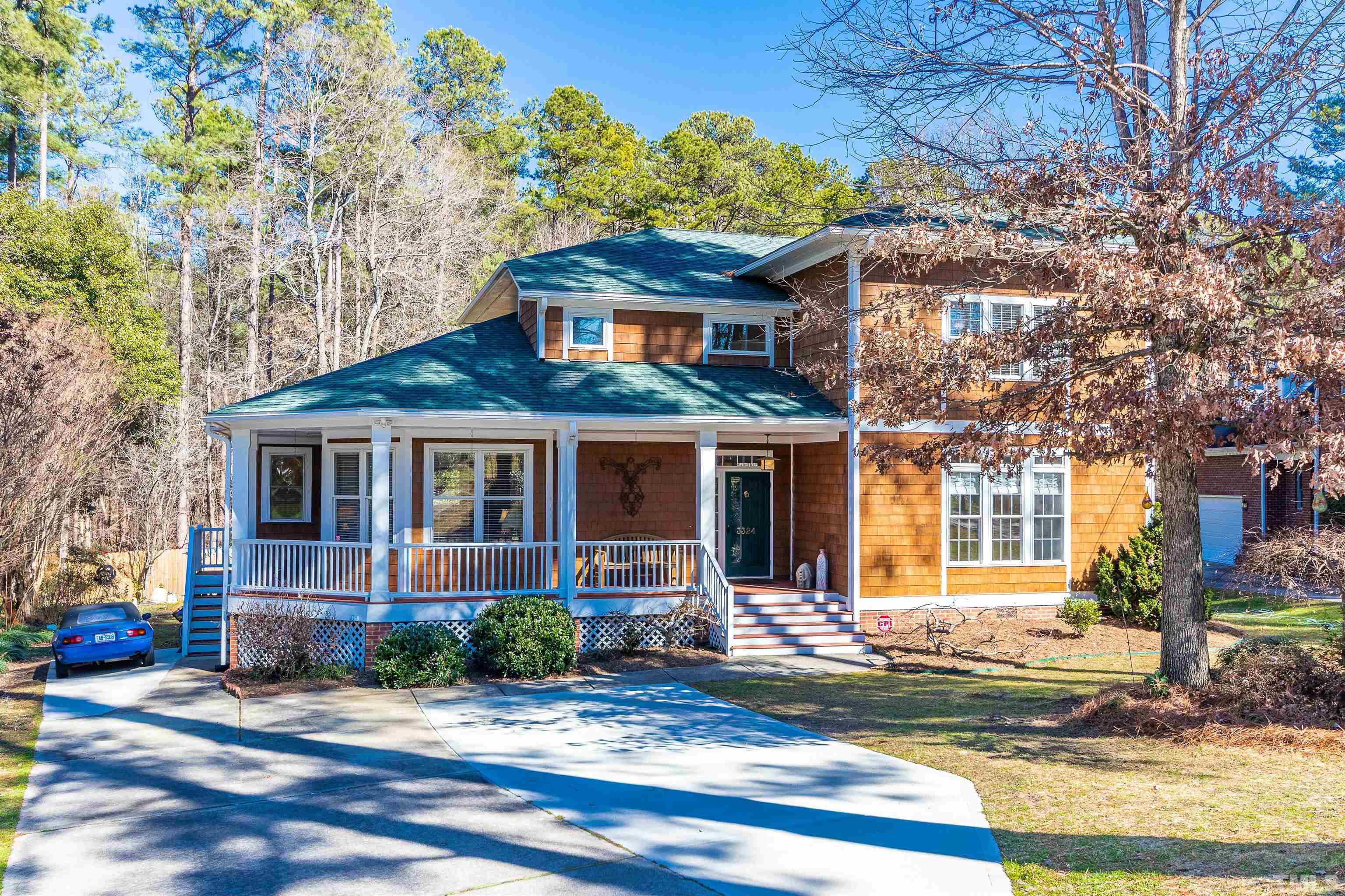 3324 Edgemont Drive Raleigh, NC 27612 - Photo 1 of 29 a front view of a house with garden