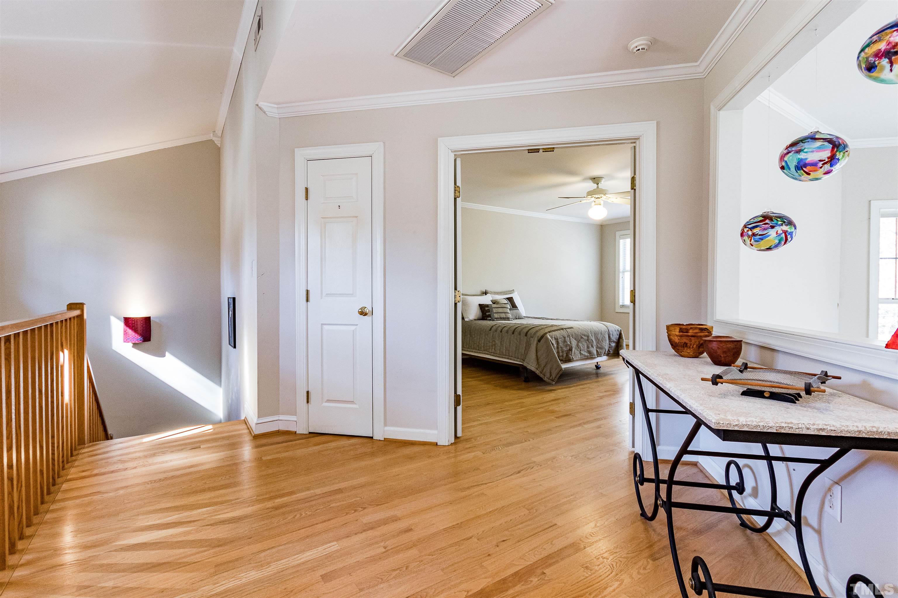 3324 Edgemont Drive Raleigh, NC 27612 - Photo 22 of 29 a view of a livingroom with furniture and a workspace