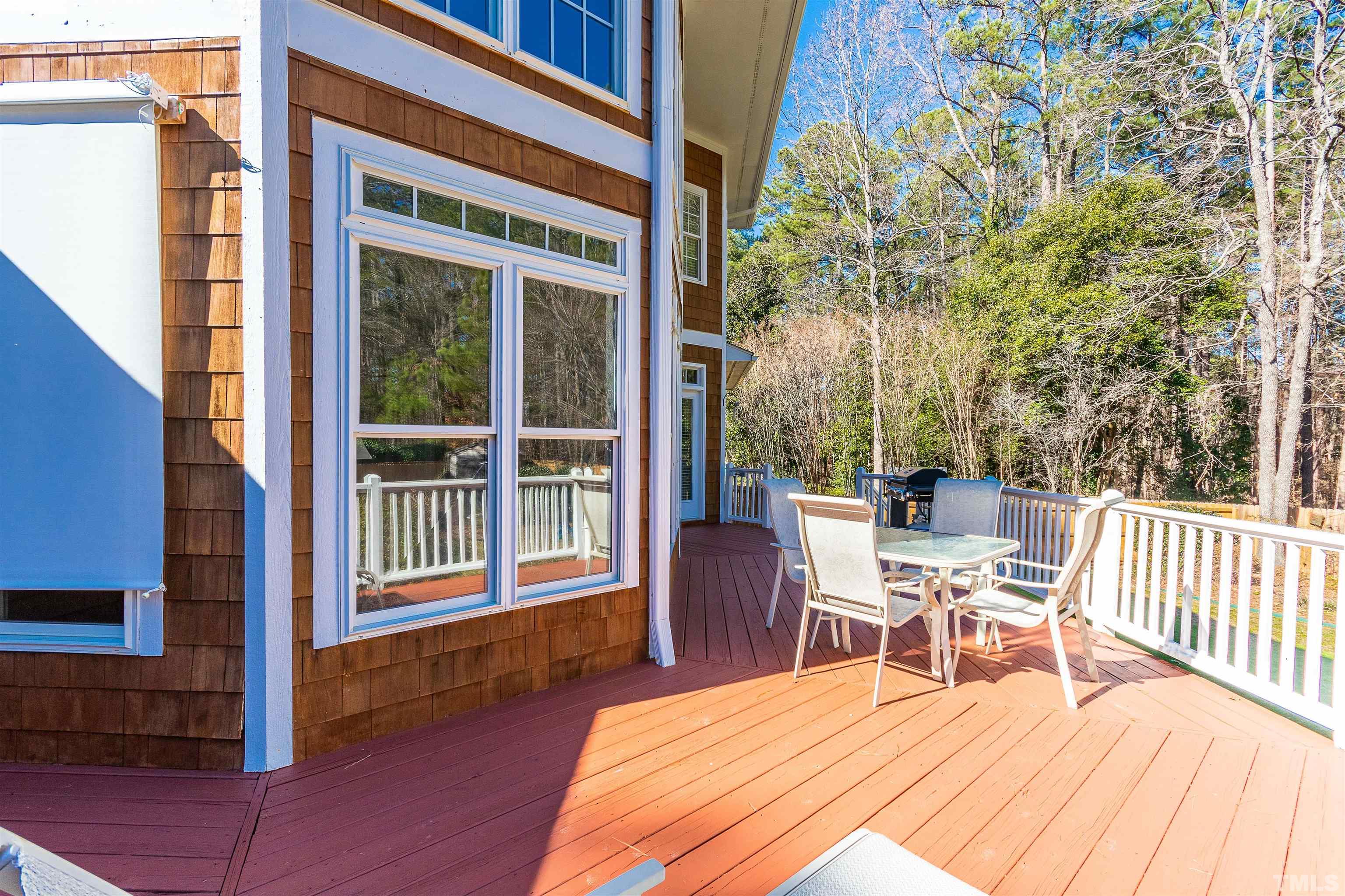 3324 Edgemont Drive Raleigh, NC 27612 - Photo 27 of 29 a view of a house with a deck and furniture