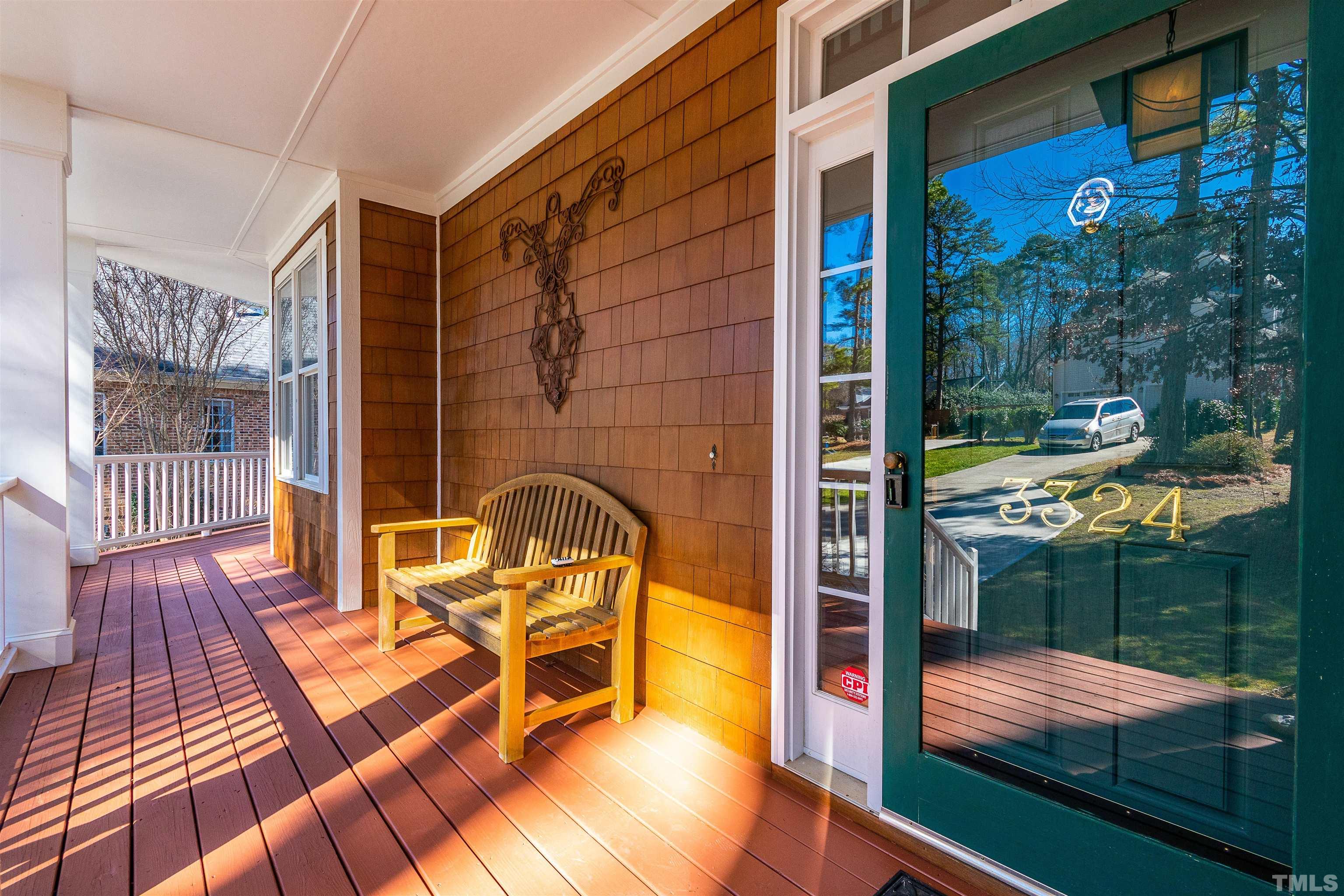 3324 Edgemont Drive Raleigh, NC 27612 - Photo 3 of 29 a view of a balcony with dining area