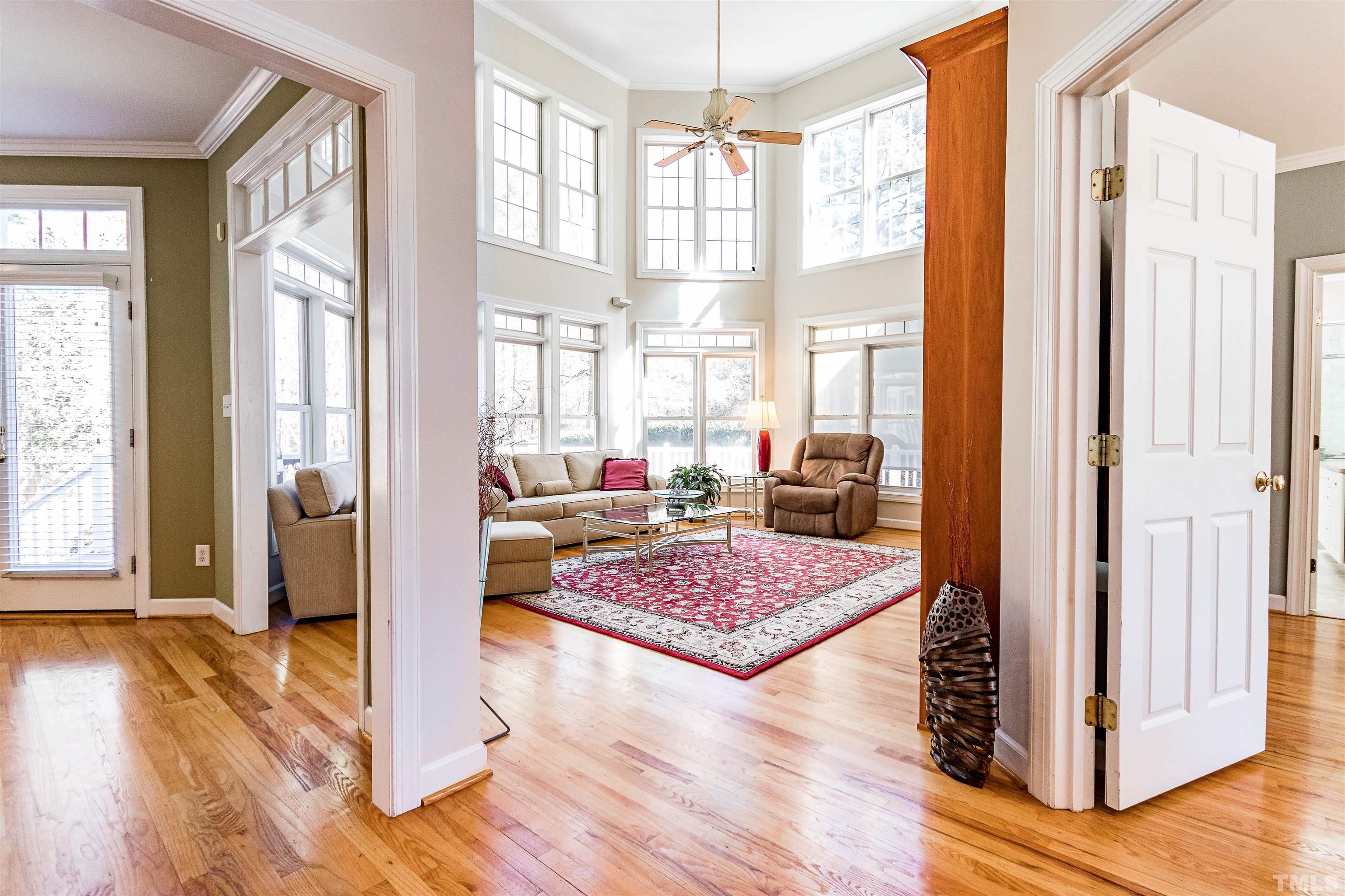 3324 Edgemont Drive Raleigh, NC 27612 - Photo 5 of 29 a very nice looking room with wooden floor and a rug