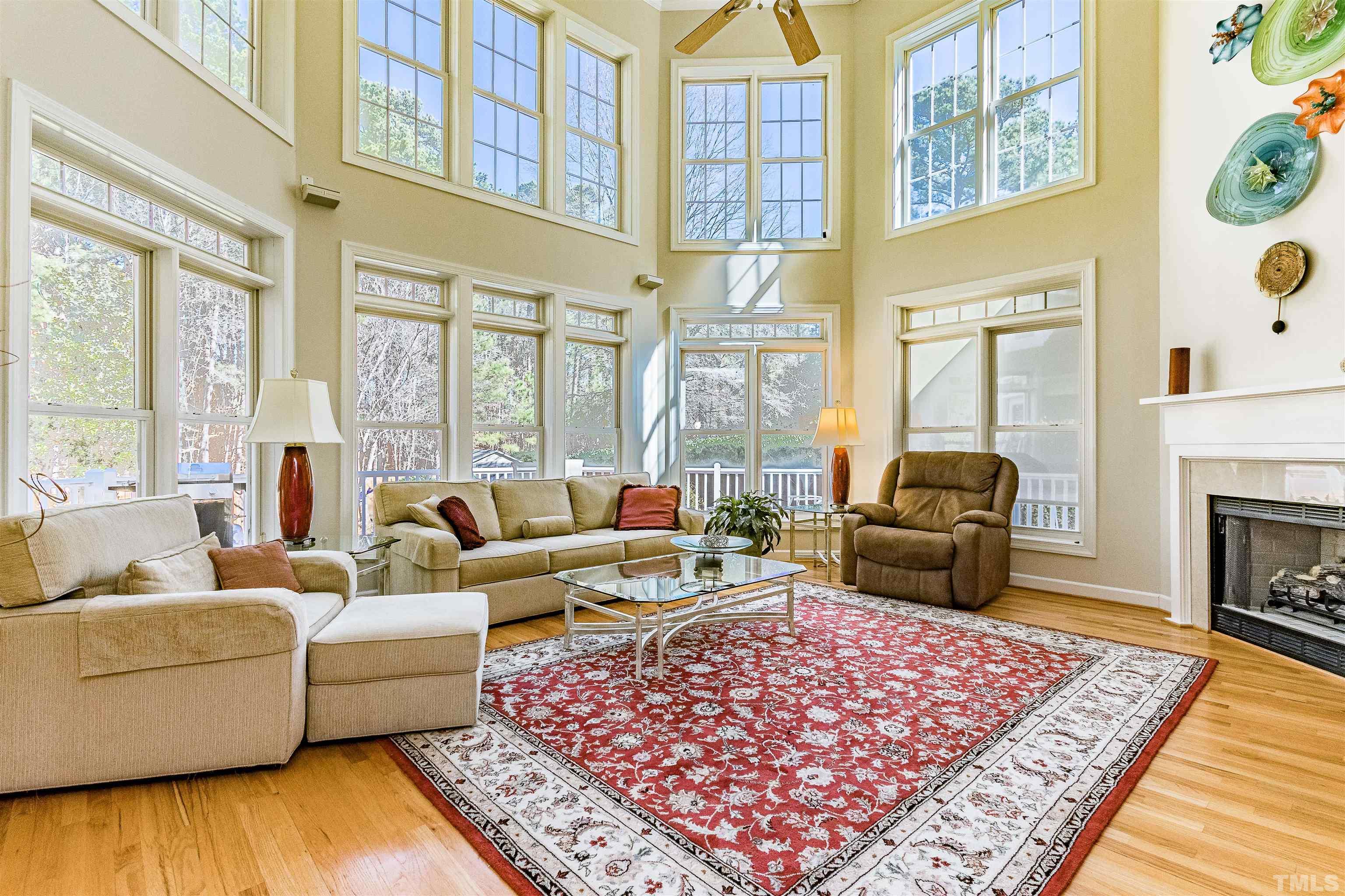 3324 Edgemont Drive Raleigh, NC 27612 - Photo 6 of 29 a living room with furniture or couch and a fireplace