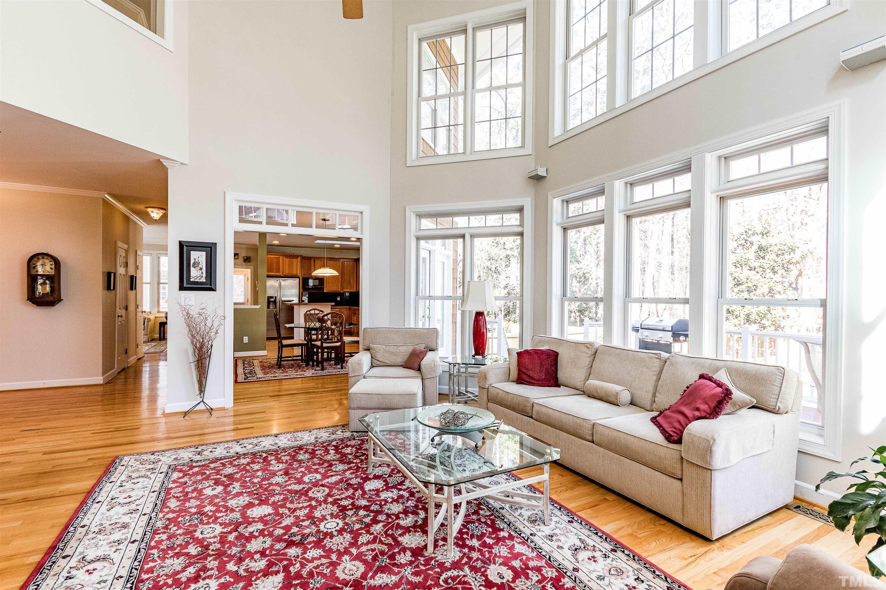 3324 Edgemont Drive Raleigh, NC 27612 - Photo 7 of 29 a living room with furniture or couch and a large window
