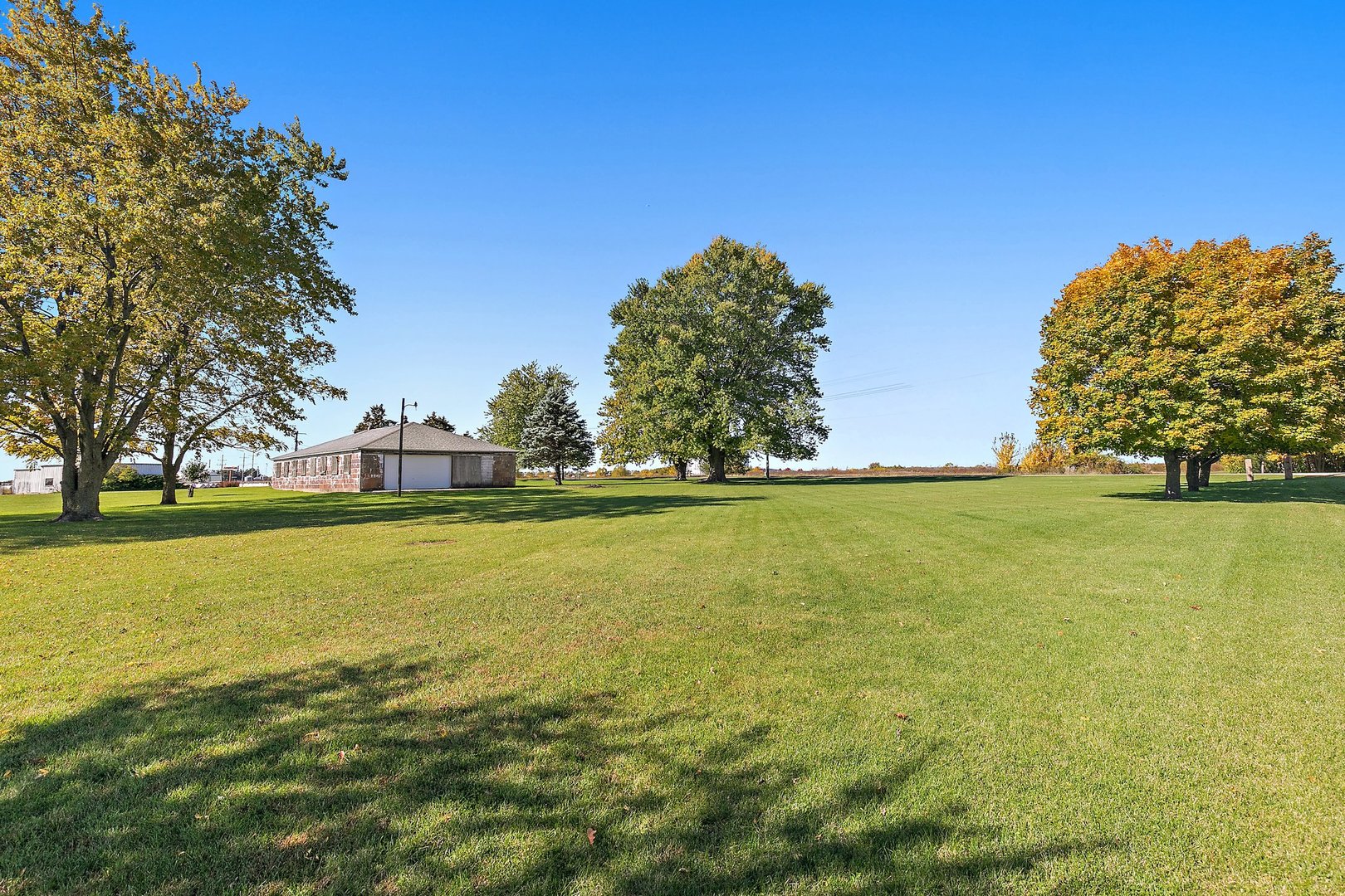10178 Preserve Road Waterman, IL 60556 - Photo 16 of 18 a view of yard and lake