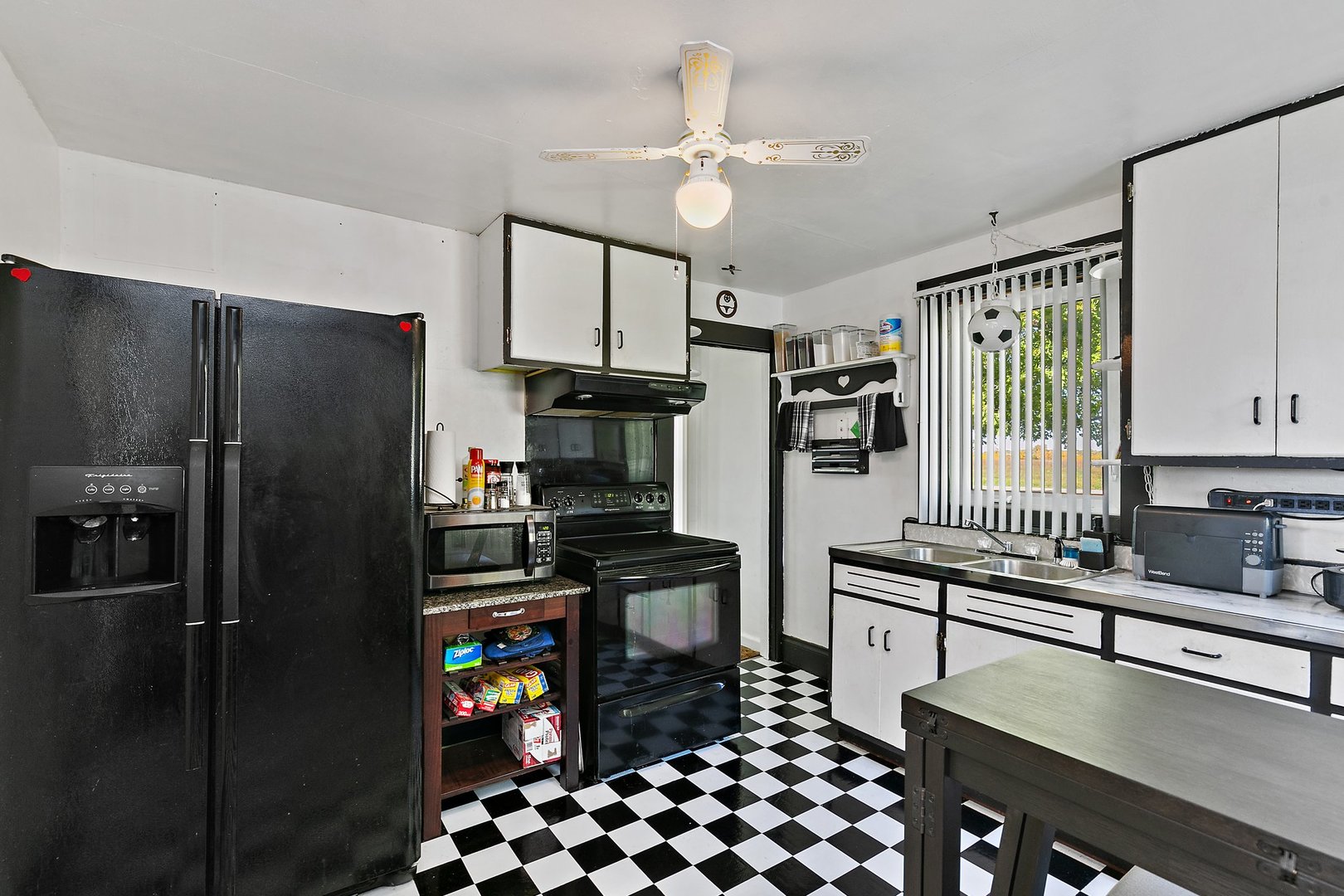10178 Preserve Road Waterman, IL 60556 - Photo 4 of 18 a kitchen with stainless steel appliances a refrigerator and a sink