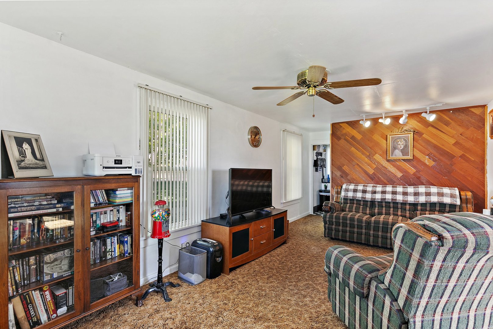 10178 Preserve Road Waterman, IL 60556 - Photo 9 of 18 a living room with furniture and a flat screen tv