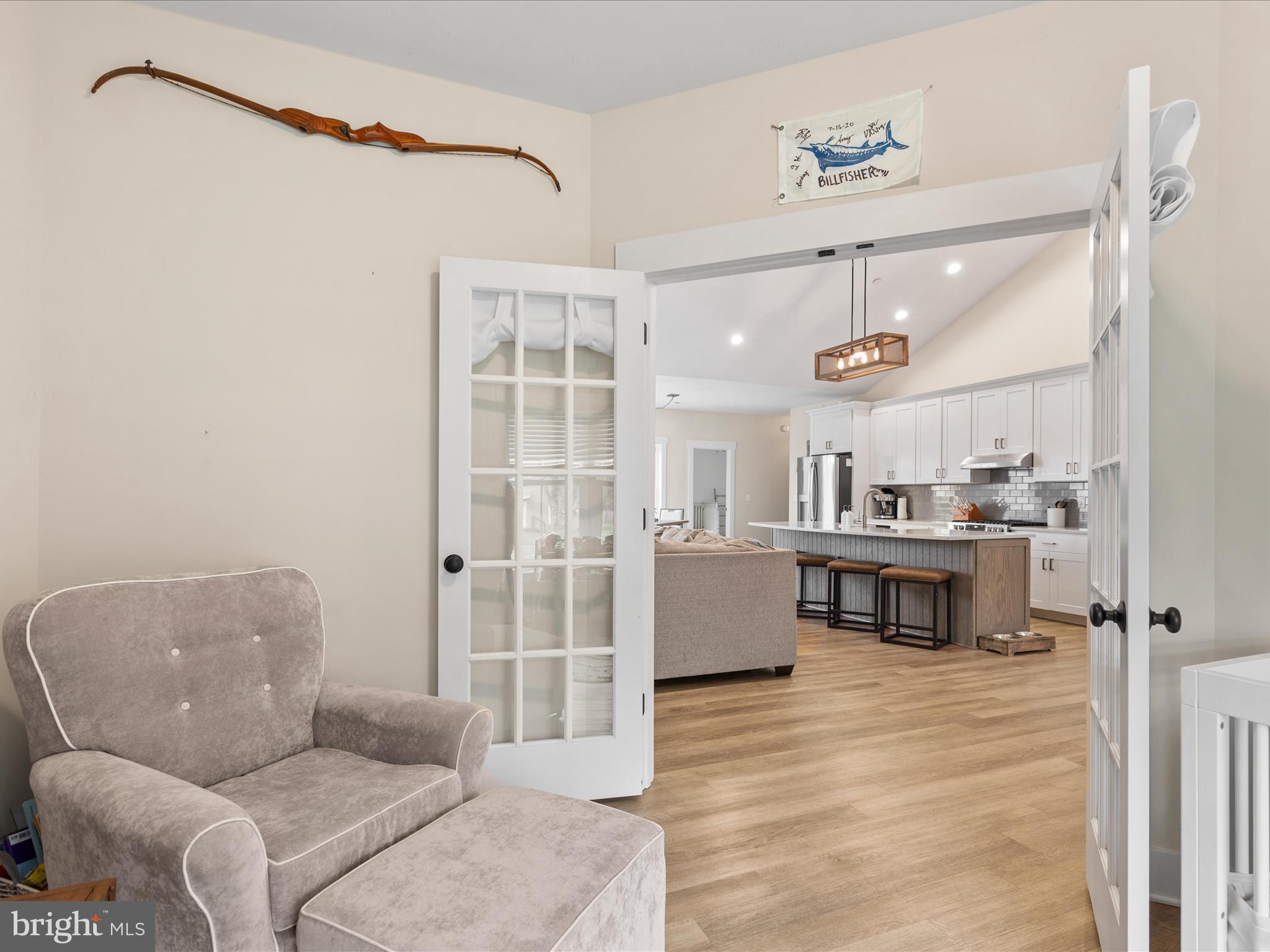 9741 Mason Road Berlin, MD 21811 - Photo 15 of 71 a living room with furniture and a table