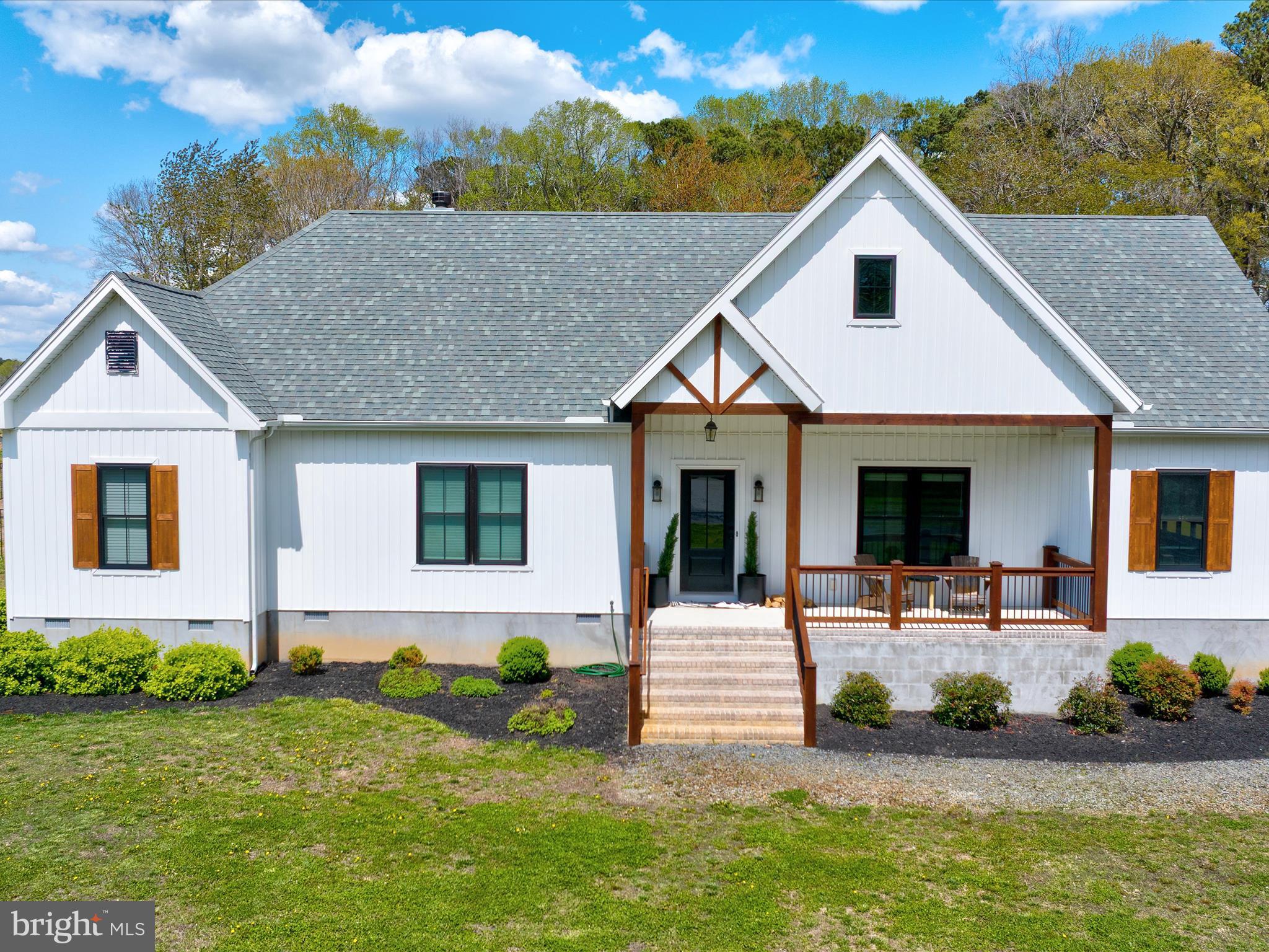 9741 Mason Road Berlin, MD 21811 - Photo 2 of 71 a front view of a house with a yard