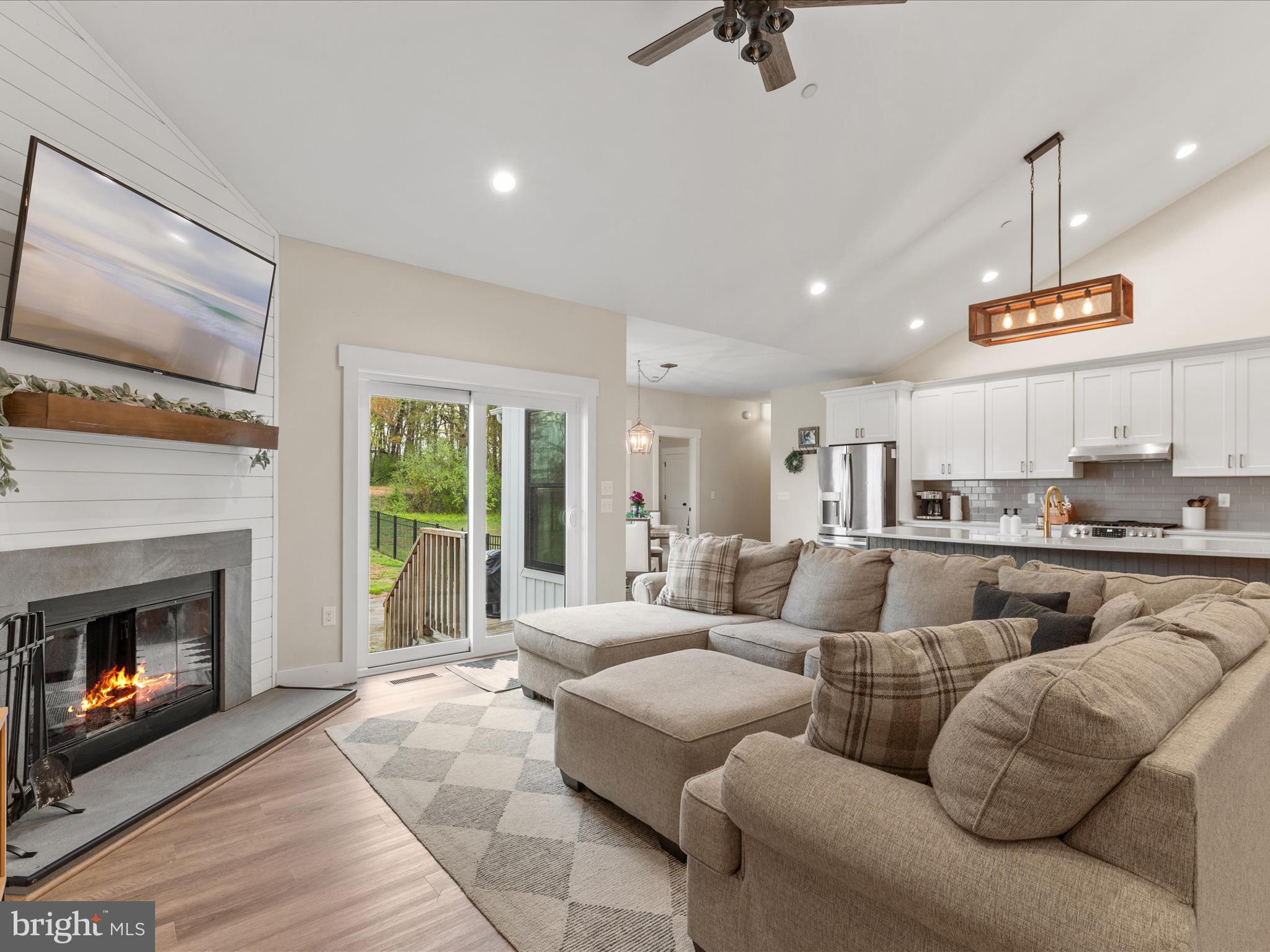 9741 Mason Road Berlin, MD 21811 - Photo 26 of 71 a living room with furniture and a fireplace