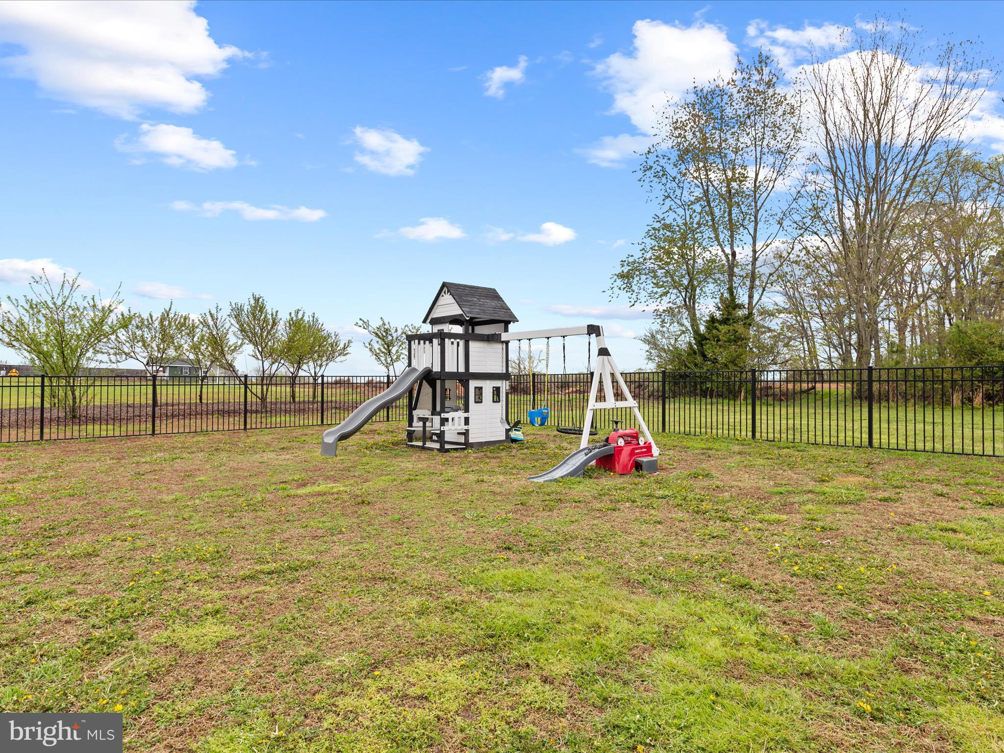 9741 Mason Road Berlin, MD 21811 - Photo 55 of 71 a view of a park with swings and slides