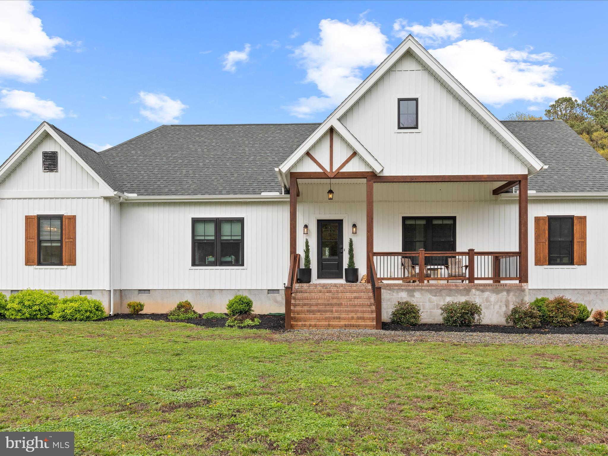 9741 Mason Road Berlin, MD 21811 - Photo 6 of 71 a front view of a house with garden
