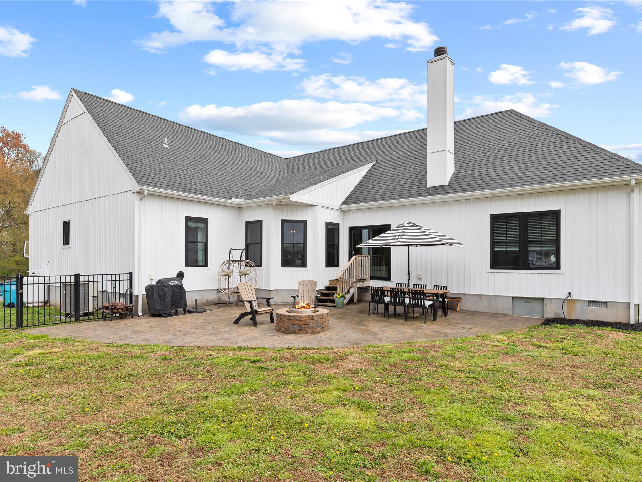 9741 Mason Road Berlin, MD 21811 - Photo 61 of 71 a front view of a house with swimming pool and sitting area