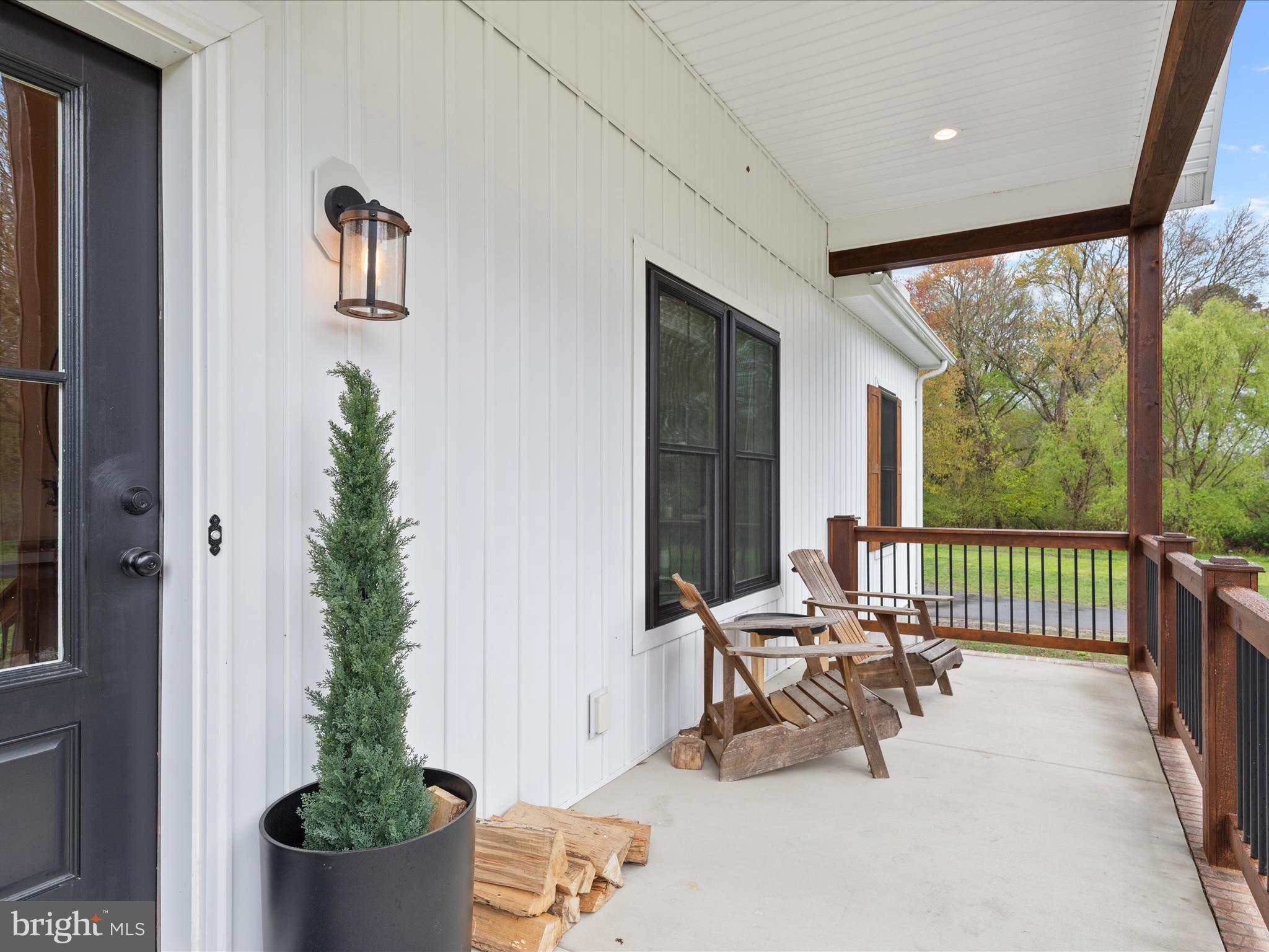 9741 Mason Road Berlin, MD 21811 - Photo 9 of 71 a building outdoor space with furniture and potted plants