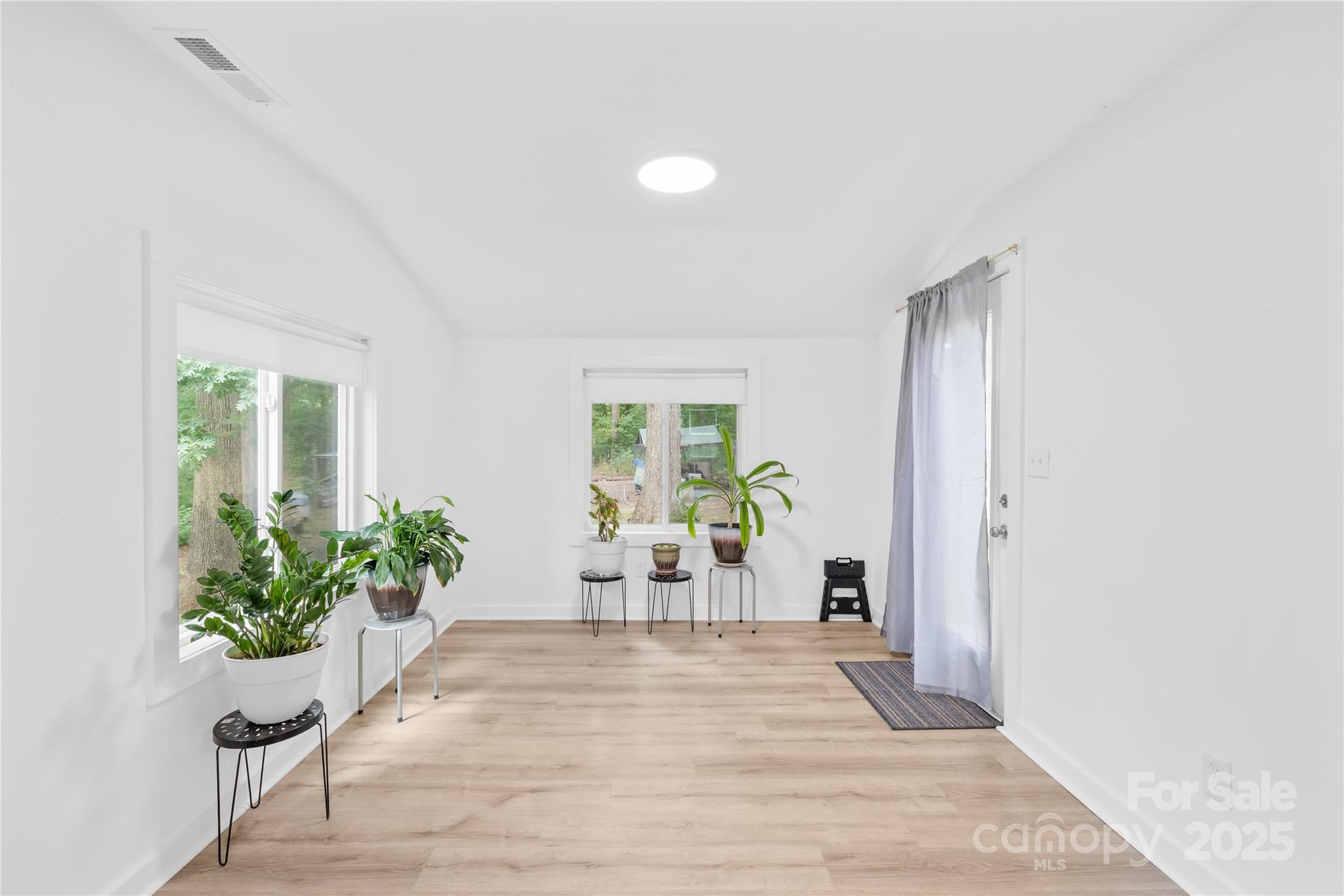 221 Reliance Road Kings Mountain, NC 28086 - Photo 11 of 26 a living room with furniture and a potted plant