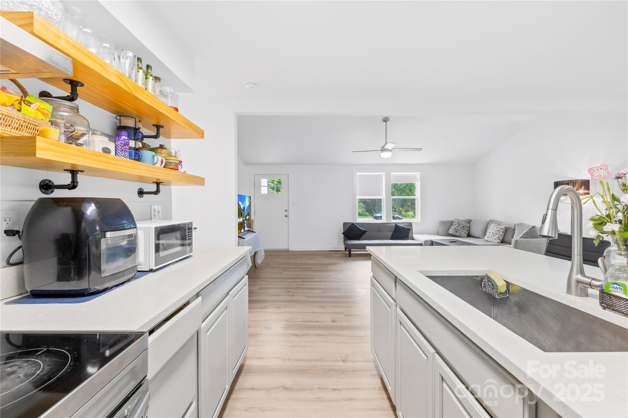 221 Reliance Road Kings Mountain, NC 28086 - Photo 14 of 26 a kitchen with stainless steel appliances granite countertop a sink and stove top oven