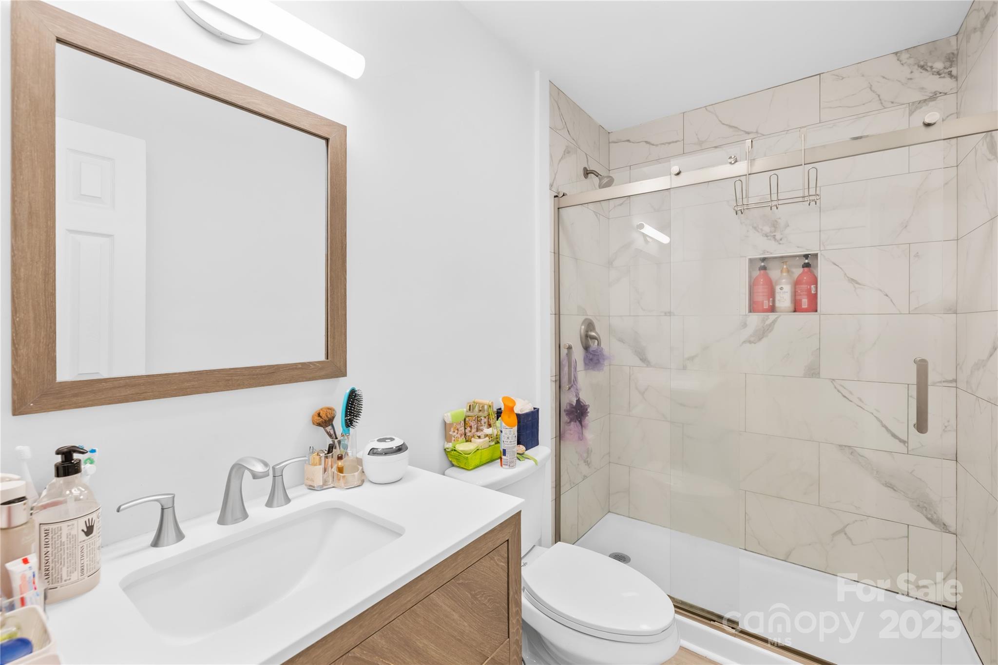 221 Reliance Road Kings Mountain, NC 28086 - Photo 16 of 26 a bathroom with a sink toilet and shower