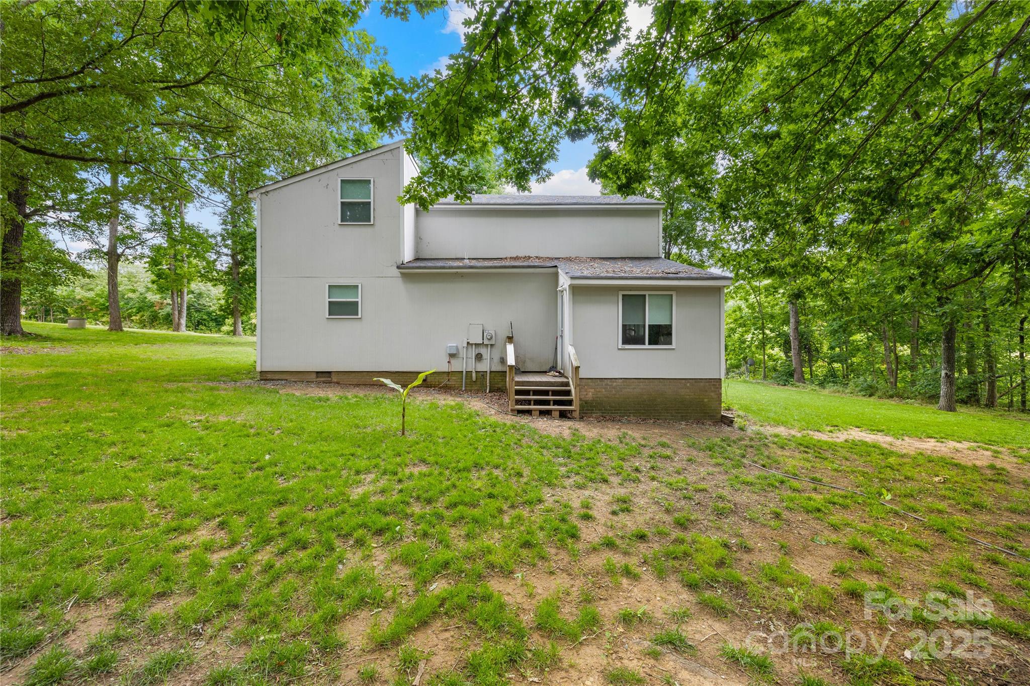 221 Reliance Road Kings Mountain, NC 28086 - Photo 23 of 26 a house view with a garden space