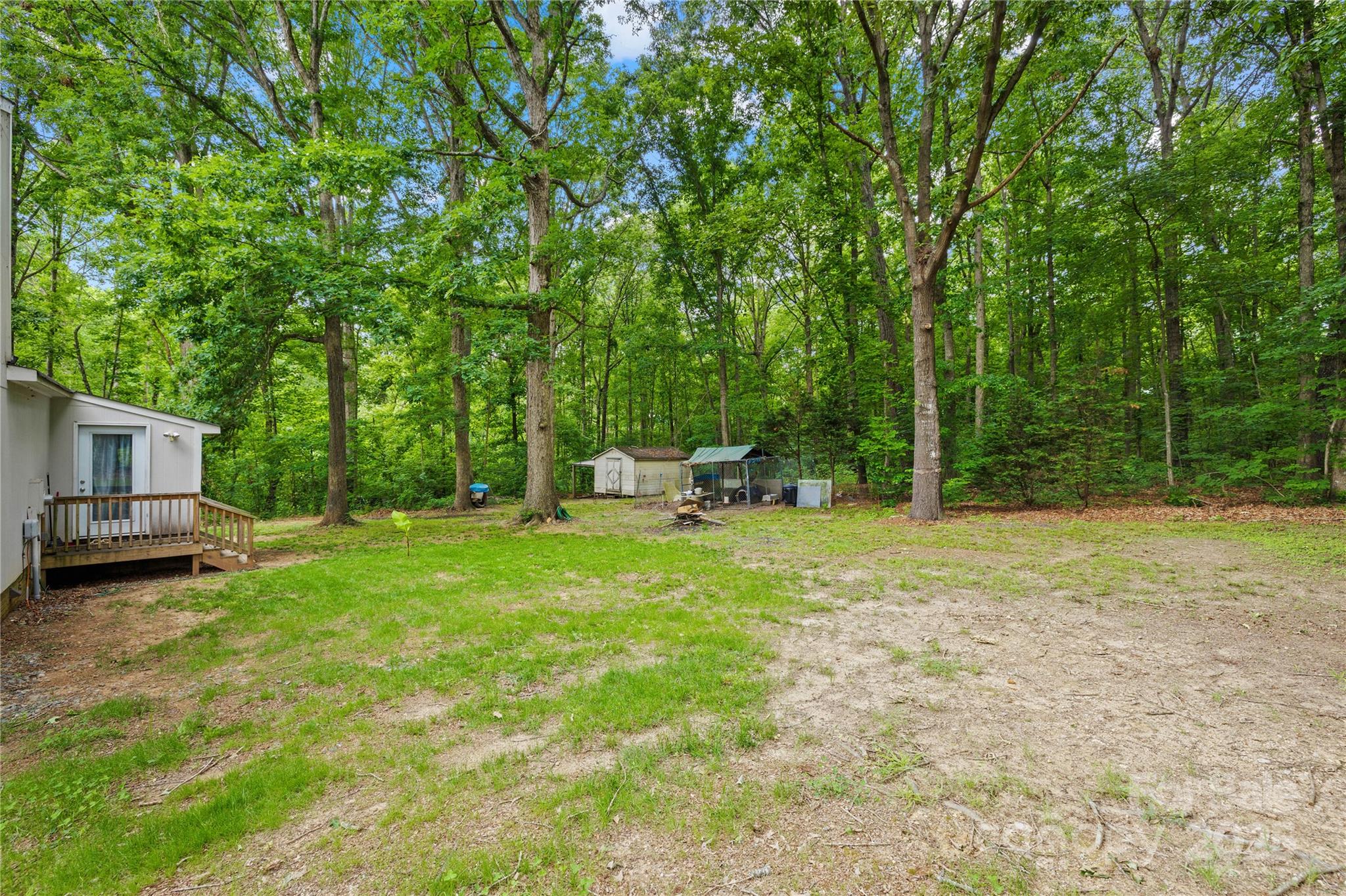 221 Reliance Road Kings Mountain, NC 28086 - Photo 25 of 26 a garden with trees in the background