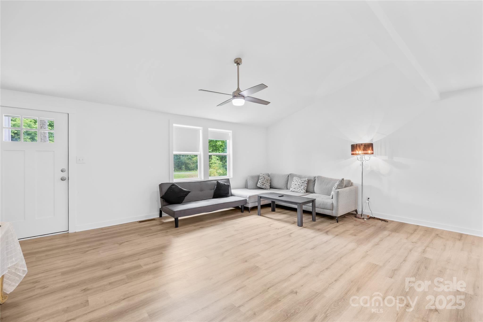 221 Reliance Road Kings Mountain, NC 28086 - Photo 5 of 26 a living room with furniture and wooden floor
