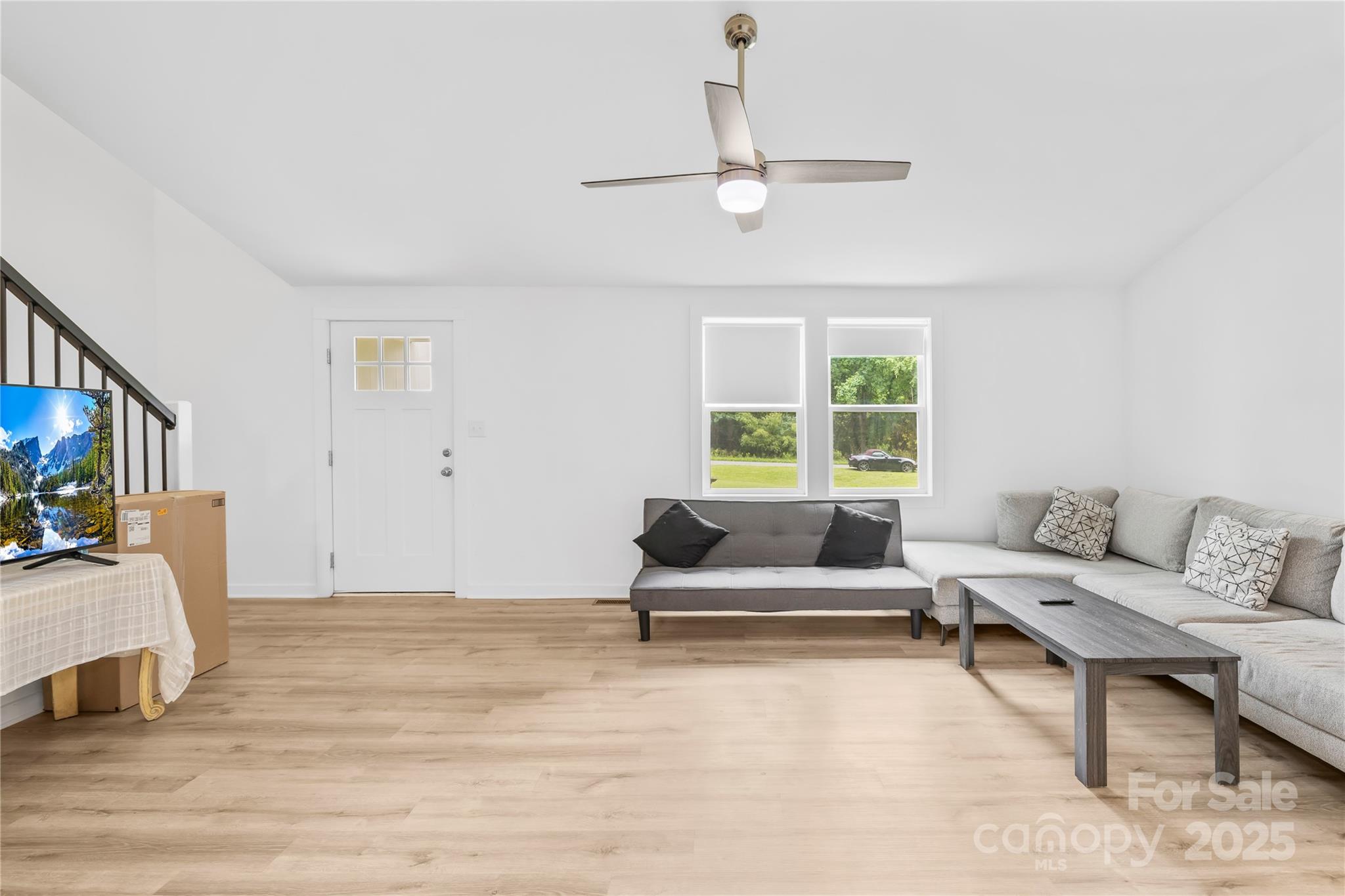 221 Reliance Road Kings Mountain, NC 28086 - Photo 6 of 26 a living room with furniture and a flat screen tv