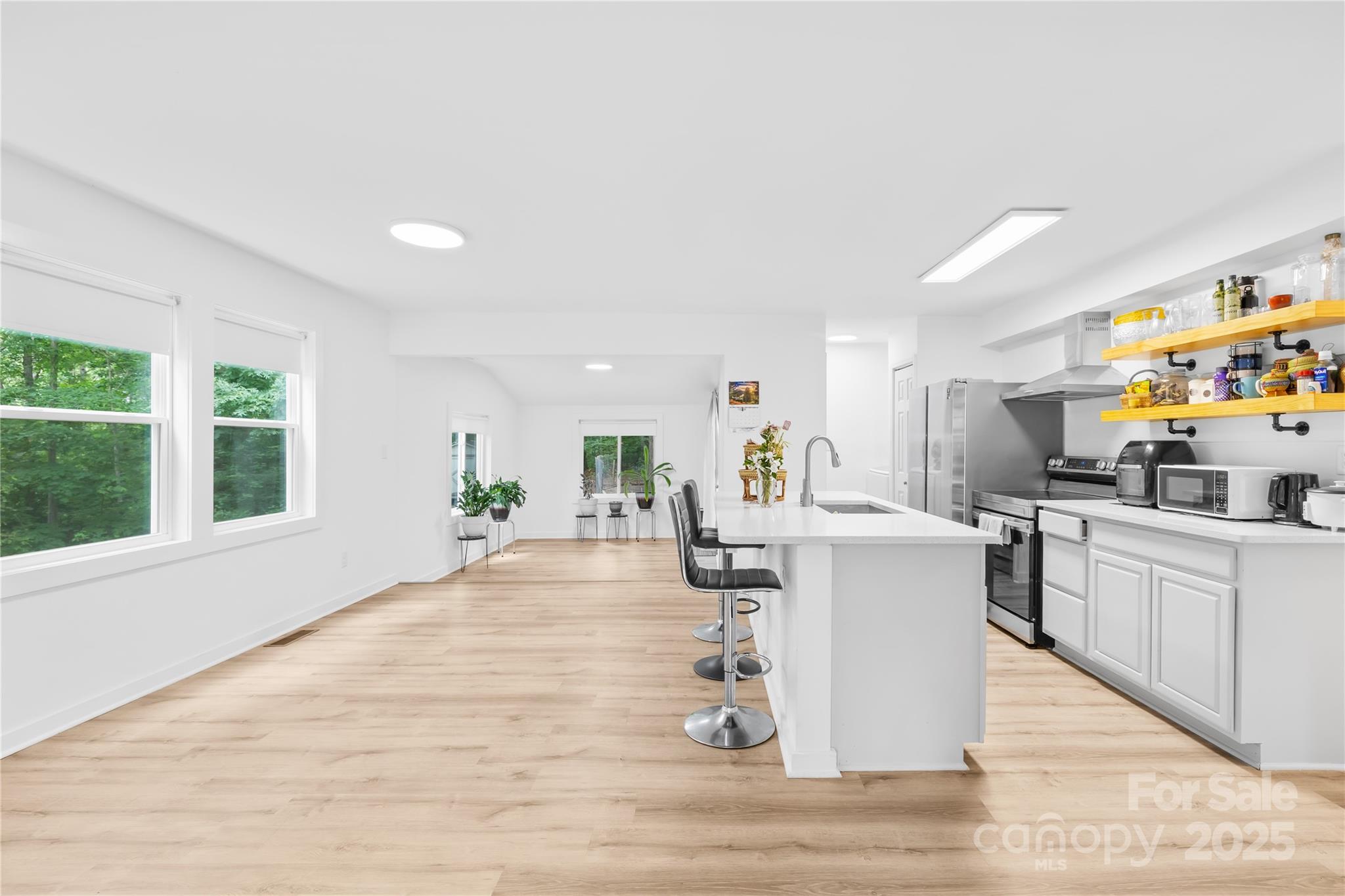 221 Reliance Road Kings Mountain, NC 28086 - Photo 9 of 26 a living room with furniture a wooden floor and sink