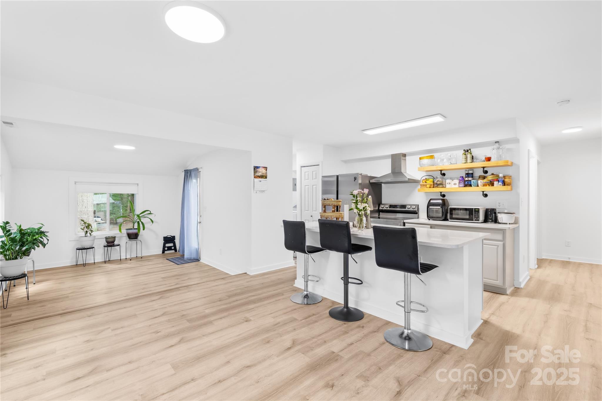 221 Reliance Road Kings Mountain, NC 28086 - Photo 10 of 26 a kitchen with stainless steel appliances kitchen island granite countertop a refrigerator and a stove top oven