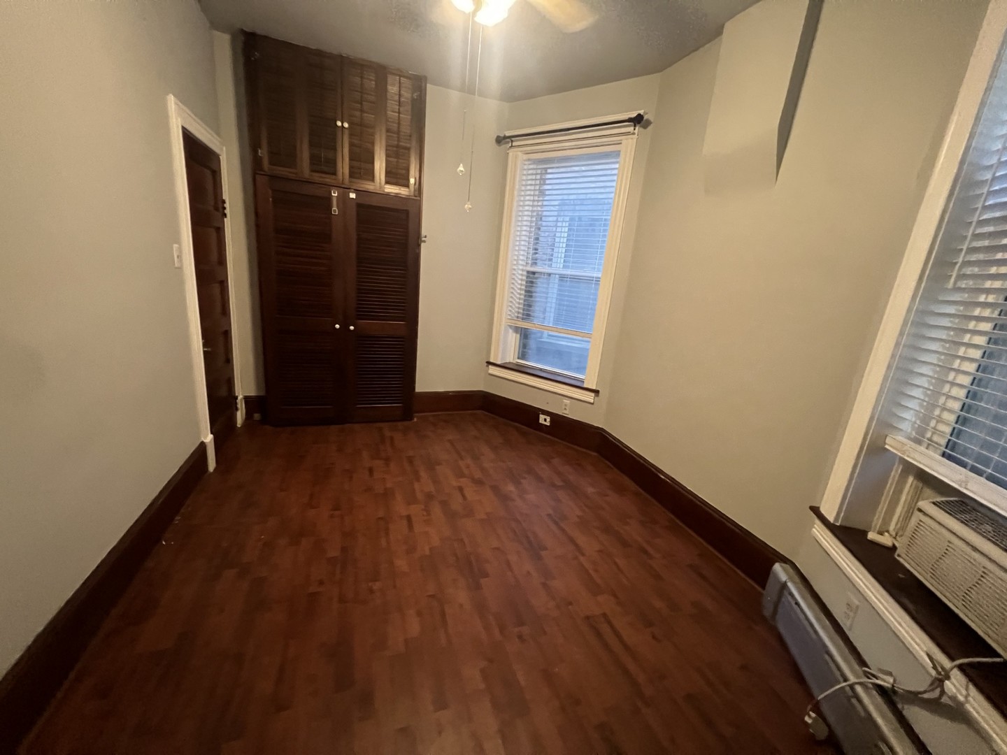 3545 North Sheffield Avenue, Unit 1 Chicago, IL 60657 - Photo 16 of 23 a view of an empty room with wooden floor